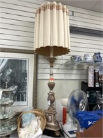 Large floor lamp with original shade. 
RefLRoom.