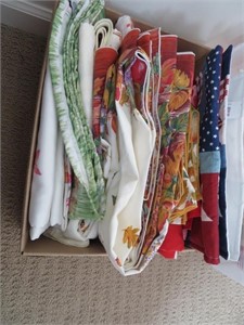 box of holiday table cloths