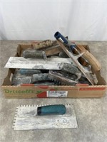 Large assortment of hand trowels and rolling