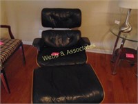 Contemporary black leather and wood chair and