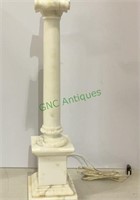 Grecian style lamp. Made of marble. Has a few
