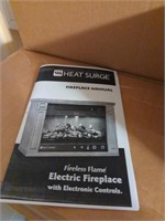 Heat surge electric fireplace in box