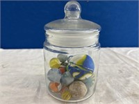 Jar Of Marbles And Rubber Balls