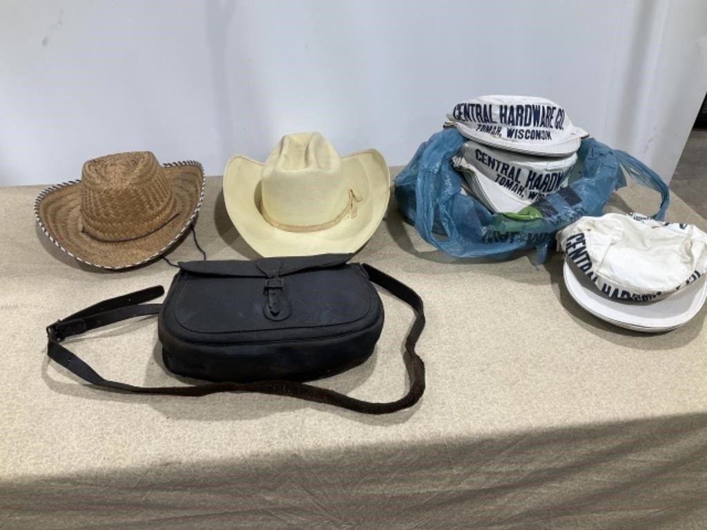 Cowboy hats, leather saddle bag, dozens painters