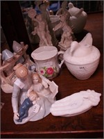 Seven glass and porcelain items: two cherubs made