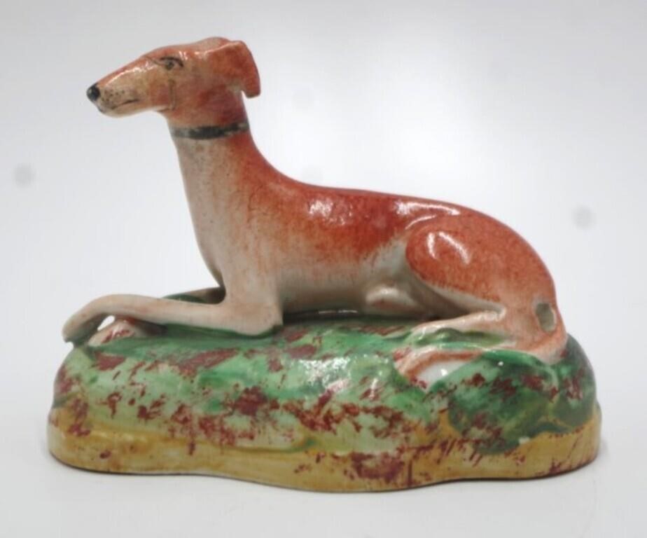 Antique resting greyhound dog figure