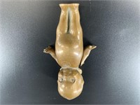 Solid bronze kewpie doll with articulating arms, w