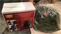 Swivel straight easy water tree stand and a bag