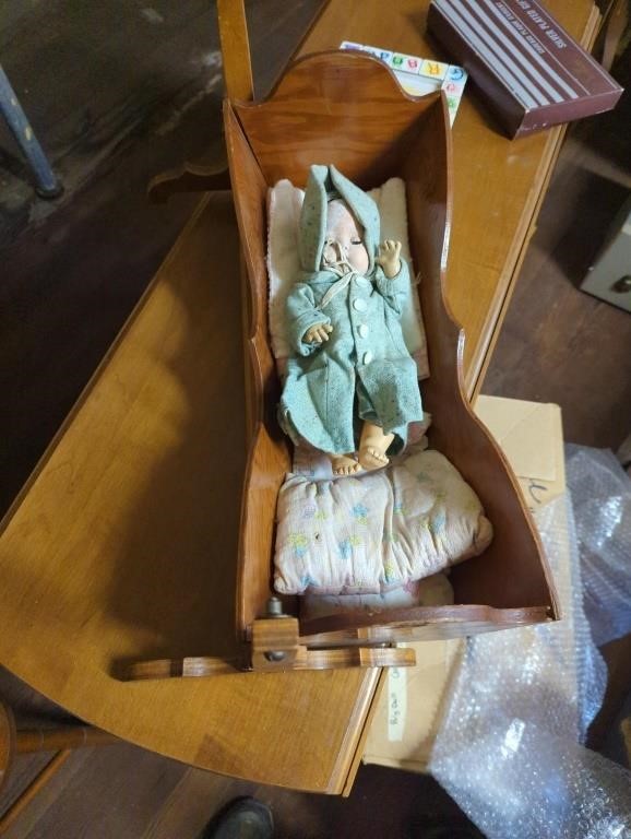 Baby cradle with two dolls