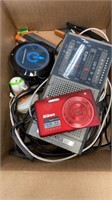 Nikon coolpix camera, radio cords etc in box