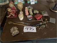 Lots of decorative shoes and purse figurines