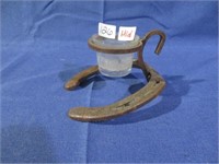 horse shoe candle holder .