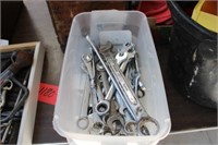 Plastic tote of wrenches