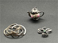 Sterling Silver Puzzle Ring & Two Pendants,