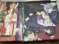 Anime prints. Scroll style hangers.