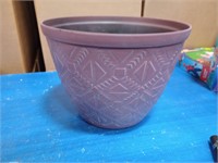 12-in round plastic planter red clay
