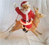 Vintage plastic Santa on reindeer with light