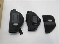 3 black holsters