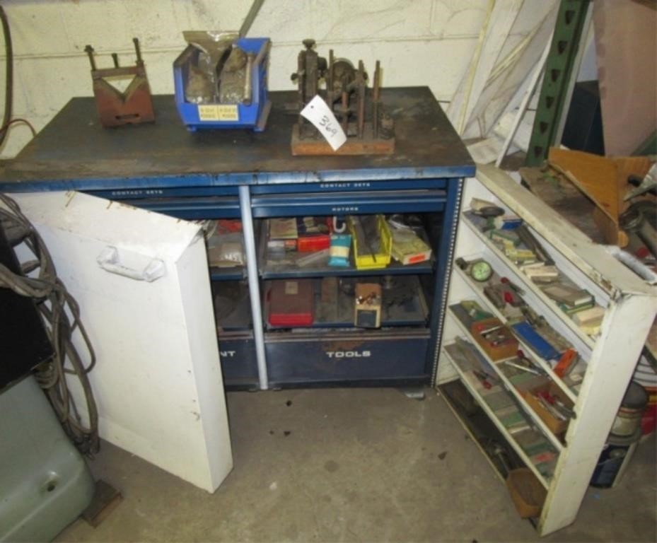 Metal shop cabinet with contents includes taps,