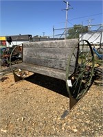 52) Homemade bench on wagon wheels