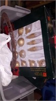 Box of Christmas ornaments and household decor