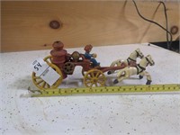 Cast iron horses and fire wagon