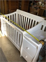 baby bed with attached changing table