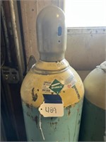 Empty Bottle of NOS Compressed Gas