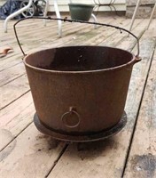 Cast iron three footed kettle, has been planter