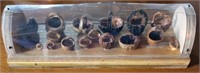 small display case of carved nut baskets