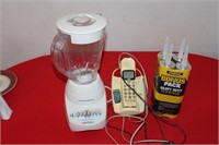 Blender, Phone & Tubes of Adhesive