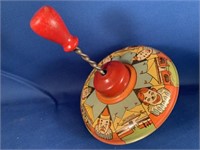 VINTAGE TIN SPINNING TOP TOY WORKS