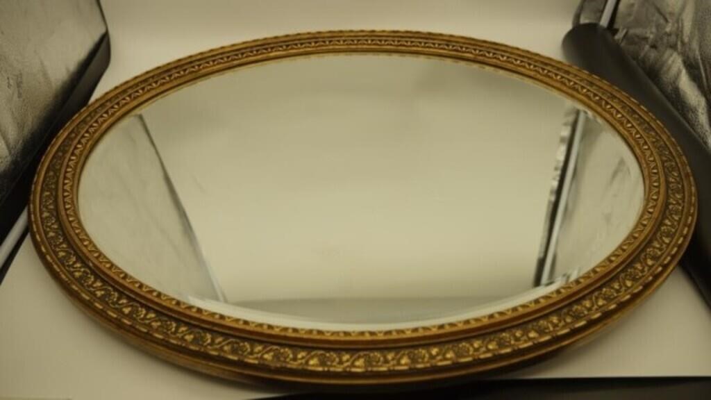 Gold trim wall mirror