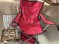 Red folding chair 32 inches x 19 with case in n