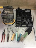 Bit set, garage light needs bulb, garden tools