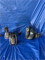 A pair of GE cordless telephone and one
