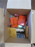 BOX OF ASSORTED VIDEOS AND PLAYING CARDS