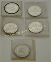 FIVE CANADIAN PRE-1967 CIRCULATED SILVER DOLLARS