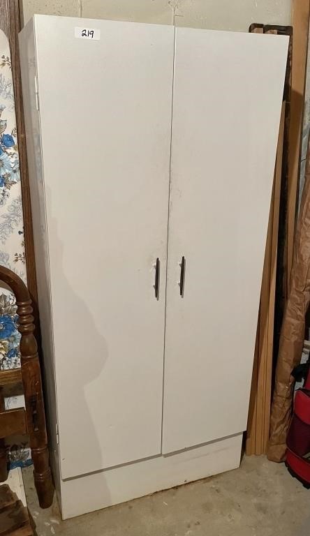 White metal 2-door cabinet and contents