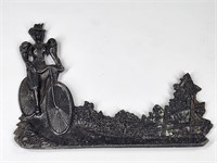 ANTIQUE 1800'S POT METAL LADY RIDING BICYCLE PLAQE