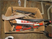 BOX OF TIRE PUMPS AND BIKE PARTS