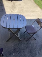Plastic table and folding chair
