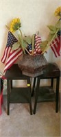 2 tables, planter with flags/sunflowers