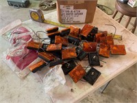 Lot of Orange Side marker lights, and 3 red lenses