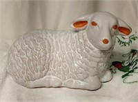 Laying white sheep