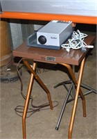 Vintage Projector With Table And Screen