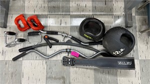Assorted weight lifting tools belt bar ball