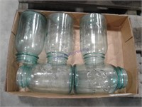 Assorted blue glass jars