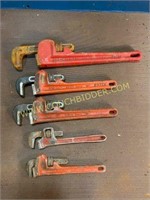 4 assorted pipe wrenches