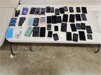 Large Assortment of Cell Phones and Cases